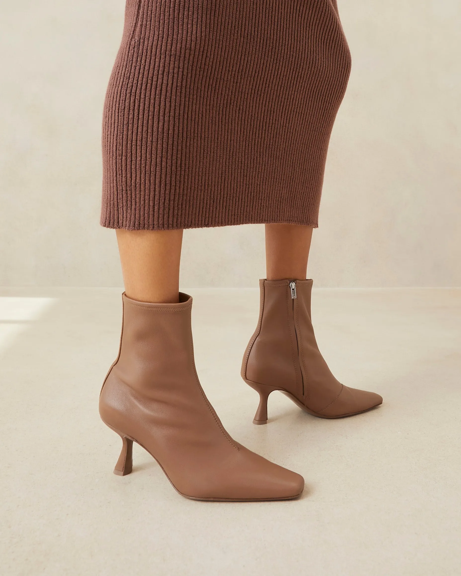 Thandy Black Curved Heel Bootie